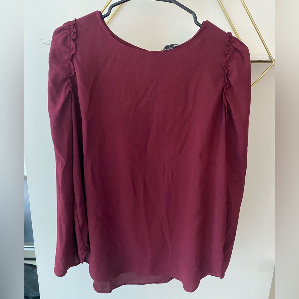 Ann Taylor size small maroon long sleeve with keyhole details